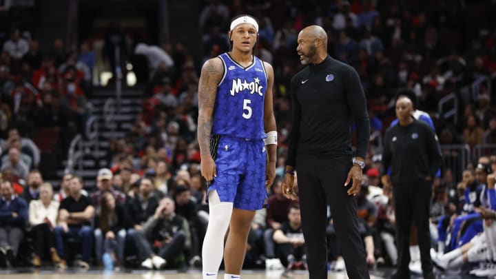 Nov 15, 2023; Orlando Magic head coach Jamahl Mosley talks with Orlando Magic forward Paolo Banchero (5) during the second half of a basketball game against the Chicago Bulls at United Center.