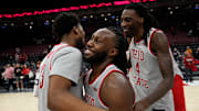 Ohio State Buckeyes forward Sean Stewart (13), guard Bruce Thornton (2) and forward Aaron Bradshaw (4) celebrate following the second overtime of the NCAA men's basketball game against the Nebraska Cornhuskers at Value City Arena in Columbus on March 4, 2025. Ohio State won 116-114.