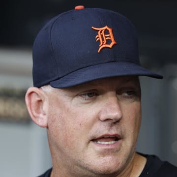 Aug 24, 2024; Chicago, Illinois, USA; Detroit Tigers manager A.J. Hinch (14) looks on from the dugout before a baseball game against the Chicago White Sox at Guaranteed Rate Field. 