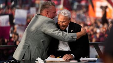 Pat McAfee hugs Lee Corso on the set of ESPN College GameDay prior to the NCAA football game between the Ohio State Buckeyes and the Texas Longhorns at Ohio Stadium on Aug. 30, 2025.