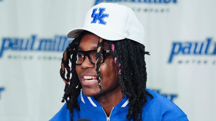 Jasper Johnson, a Lexington native and one of the top basketball players in the 2025 high school class, announces his commitment to the University of Kentucky during a ceremony at the Woodford County High School in Versailles, Ky. on Sep. 5, 2024. Jasper Johnson, a Lexington native and one of the top basketball players in the 2025 high school class, announces his commitment to the University of Kentucky during a ceremony at the Woodford County High School in Versailles, Ky. on Sep. 5, 2024.