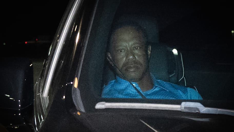 Tiger Woods is seen leaving Martin County (Fla.) Jail after being arrested for driving under the influence after a car crash.