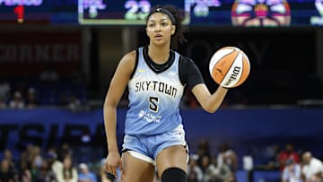 Jun 24, 2025; Chicago, Illinois, USA; Chicago Sky forward Angel Reese (5) brings the ball up court against the Los Angeles Sparks during the first half at Wintrust Arena. Mandatory Credit: Kamil Krzaczynski-Imagn Images