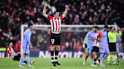 Barcelona players look dejected as Athletic Club celebrate
