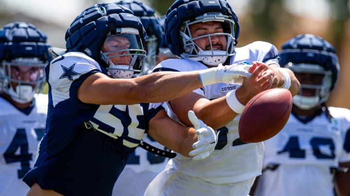 Aug 1, 2023; Oxnard, CA, USA; Dallas Cowboys linebacker Leighton Vander Esch (55) and tight end Jake Ferguson (87) run a drill during training camp at Marriott Residence Inn-River Ridge playing fields. 