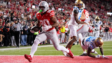 Ohio State Buckeyes running back James Peoples (20) runs for a touchdown during the NCAA football game against the UCLA Bruins at Ohio Stadium in Columbus on Nov. 15, 2025. Ohio State won 48-10.
