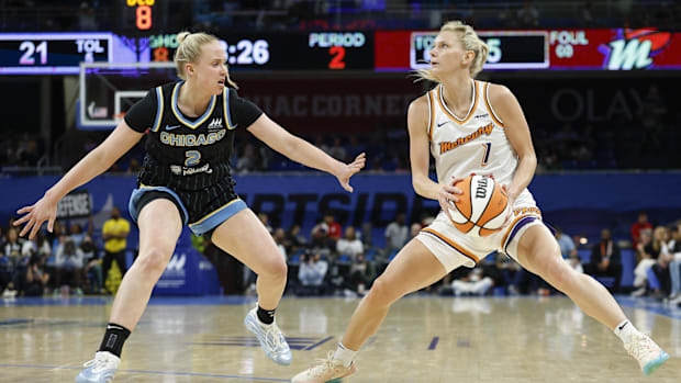 A photo of Lexi Held attempting a stepbac