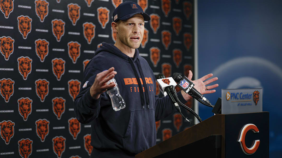 Chicago Bears head coach Ben Johnson (R) speaks during the Rookie Minicamp at Halas Hall.