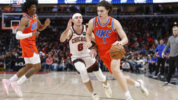 Jan 13, 2023; Chicago, Illinois, USA; Oklahoma City Thunder guard Josh Giddey (3) drives to the basket against Chicago Bulls guard Alex Caruso (6) during the second half at United Center. Mandatory Credit: Kamil Krzaczynski-USA TODAY Sports