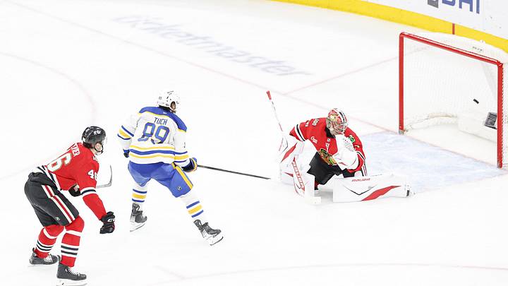 Apr 13, 2026; Chicago, Illinois, USA; Buffalo Sabres right wing Alex Tuch (89) scores a goal against Chicago Blackhawks goaltender Spencer Knight (30) during the third period at United Center. Mandatory Credit: Kamil Krzaczynski-Imagn Images