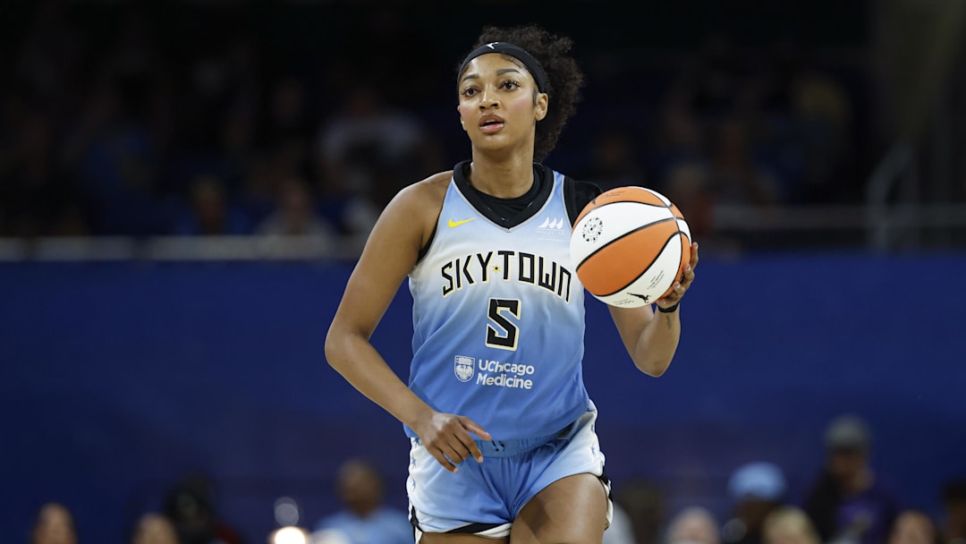 Jun 24, 2025; Chicago, Illinois, USA; Chicago Sky forward Angel Reese (5) brings the ball up court against the Los Angeles Sparks during the first half at Wintrust Arena. Mandatory Credit: Kamil Krzaczynski-Imagn Images