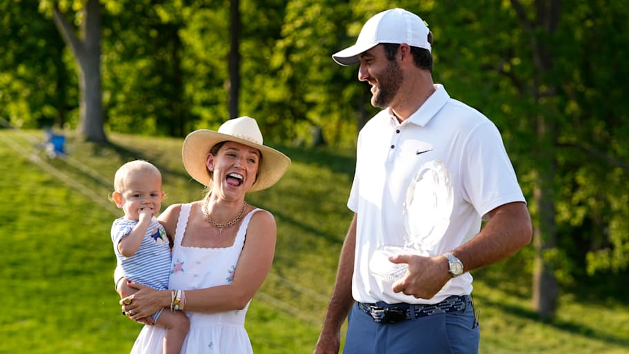 Scottie Scheffler celebrates with his wife, Meredith, and son, Bennett, after winning the Memorial Tournament at Muirfield Village Golf Club in Dublin following the final round on June 1, 2025. | Adam Cairns/Columbus Dispatch / USA TODAY NETWORK via Imagn Images