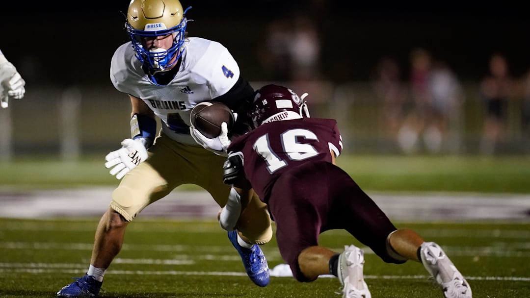 Brentwood's Clayton Merrill (4) tries to evade Franklin's Luke Thompson (16) during the first quarter at Franklin High School in Franklin, Tenn., Friday, Sept. 29, 2023.