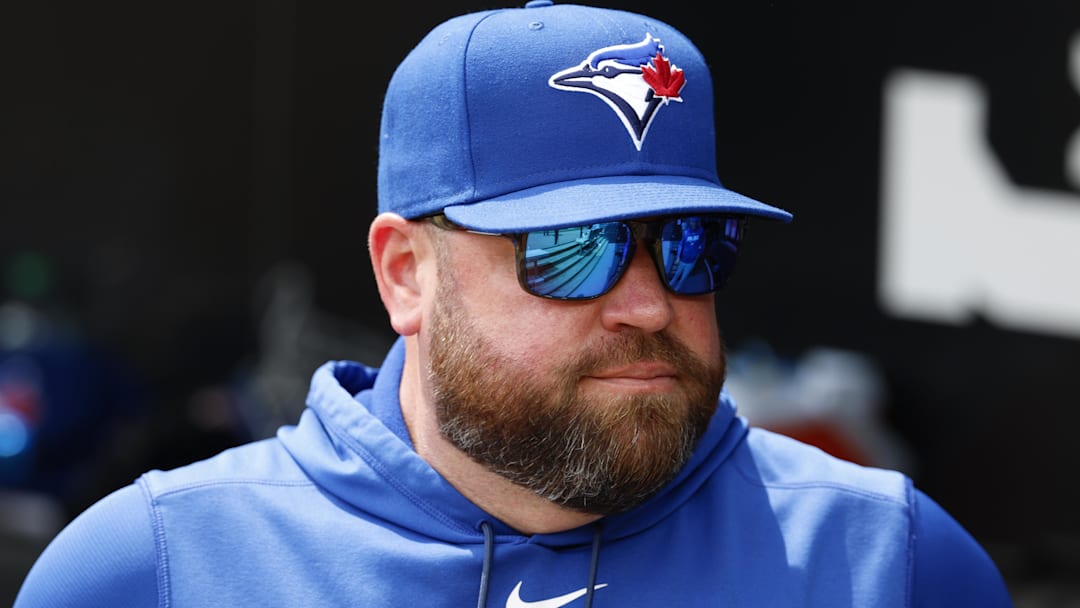 Apr 3, 2026; Chicago, Illinois, USA; Toronto Blue Jays manager John Schneider looks on from the dugout before a baseball game against the Chicago White Sox at Rate Field
