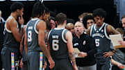 Louisville basketball coach Pat Kelsey instructs his team during a timeout against Wake Forest in their game at the KFC Yum! Center 