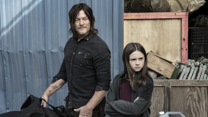 Norman Reedus as Daryl Dixon, Cailey Fleming as Judith - The Walking Dead _ Season 11, Episode 18 - Photo Credit: Jace Downs/AMC