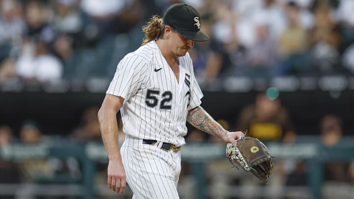 Sep 30, 2023: Chicago White Sox starting pitcher Mike Clevinger (52) walks back to the dugout after pitching in the first inning of a baseball game against the San Diego Padres at Guaranteed Rate Field. 