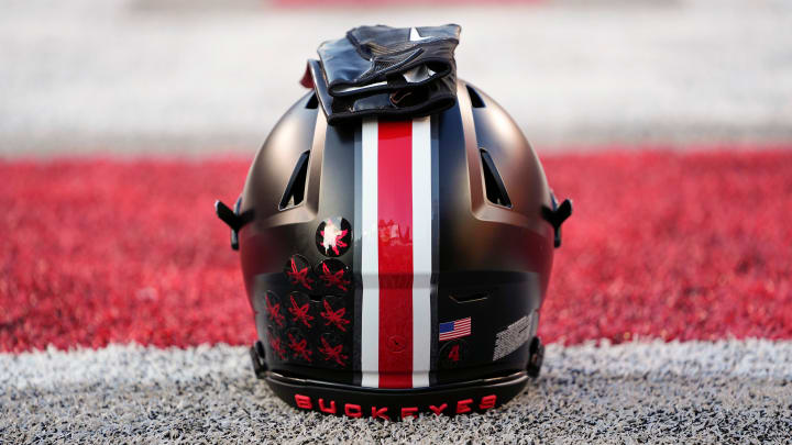 Sep 24, 2022; Columbus, Ohio, USA; A black helmet sits on the sideline as part of the special uniform the Ohio State Buckeyes will wear in the NCAA Division I football game against the Wisconsin Badgers at Ohio Stadium. Mandatory Credit: Adam Cairns-The Columbus Dispatch

Ncaa Football Wisconsin Badgers At Ohio State Buckeyes