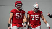 Mar 7, 2024; Columbus, OH, USA; Ohio State Buckeyes offensive lineman Luke Montgomery (51) and offensive lineman Carson Hinzman (75) work out during spring football practice at the Woody Hayes Athletic Center.