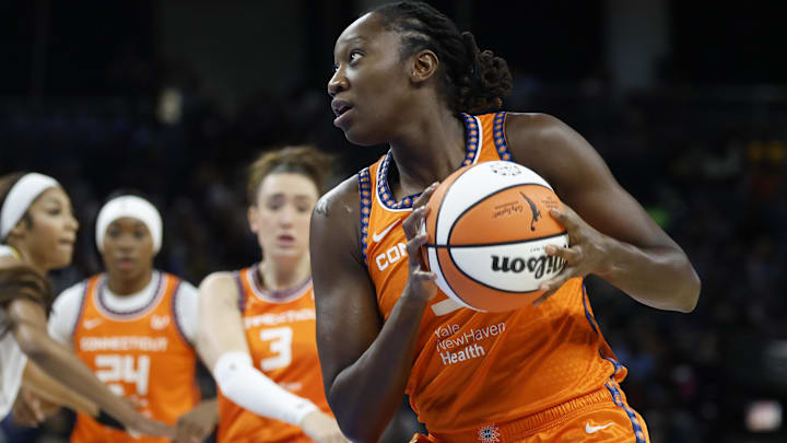 Aug 23, 2025; Chicago, Illinois, USA; Connecticut Sun center Tina Charles (31) drives to the basket against the Chicago Sky during the first half at Wintrust Arena. 