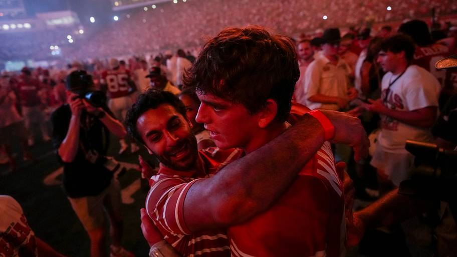 Fans celebrate with Texas Longhorns quarterback Arch Manning following a win over Ohio State.