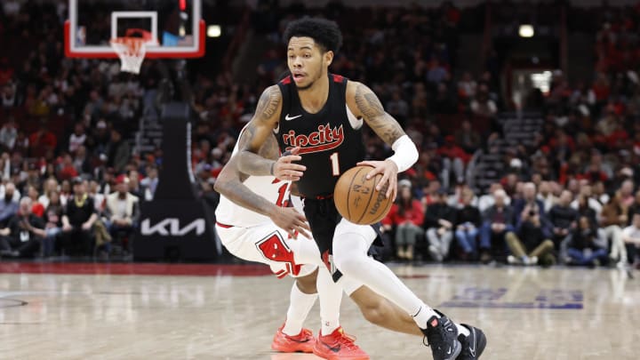 Mar 18, 2024; Chicago, Illinois, USA; Portland Trail Blazers guard Anfernee Simons (1) drives to the basket against the Chicago Bulls during the second half at United Center. Mandatory Credit: Kamil Krzaczynski-USA TODAY Sports