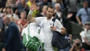 Jun 29, 2022; London, United Kingdom; Andy Murray (GBR) leaves the court after his second round match against John Isner (USA) on day three at All England Lawn Tennis and Croquet Club. Mandatory Credit: Susan Mullane-USA TODAY Sports