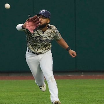 Jun 28, 2023; Columbus, Ohio, USA;  Columbus Clippers right fielder George Valera (13) catches a ball during the MiLB baseball game against the Toledo Mud Hens at Huntington Park. Mandatory Credit: Adam Cairns-The Columbus Dispatch