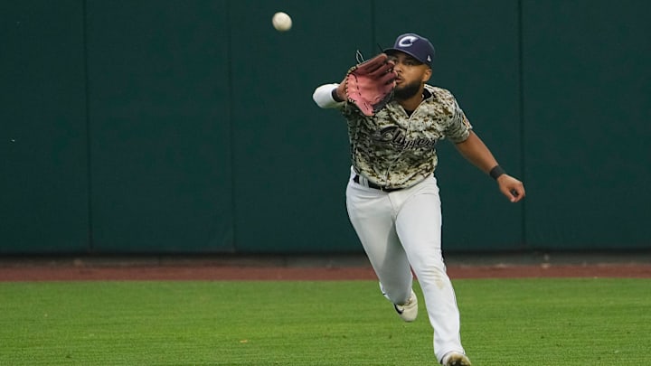 Jun 28, 2023; Columbus, Ohio, USA;  Columbus Clippers right fielder George Valera (13) catches a ball during the MiLB baseball game against the Toledo Mud Hens at Huntington Park. Mandatory Credit: Adam Cairns-The Columbus Dispatch