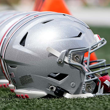 Sep 2, 2023; Bloomington, Indiana, USA; Ohio State Buckeyes helmets sit on the sideline prior to the NCAA football game at Indiana University Memorial Stadium. Ohio State won 23-3.