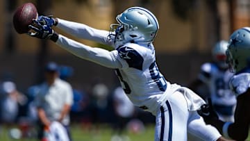 Dallas Cowboys wide receiver Jalen Brooks (83) reaches for the ball during training camp at Marriott Residence Inn-River Ridge playing fields.