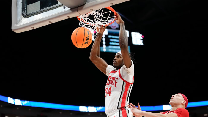 Mar 19, 2024; Columbus, OH, USA; Ohio State Buckeyes center Felix Okpara (34) dunks over Cornell Big