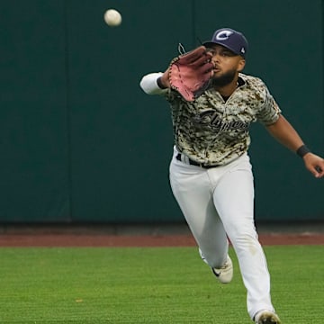 Jun 28, 2023; Columbus, Ohio, USA;  Columbus Clippers right fielder George Valera (13) catches a ball during the MiLB baseball game against the Toledo Mud Hens at Huntington Park. Mandatory Credit: Adam Cairns-The Columbus Dispatch