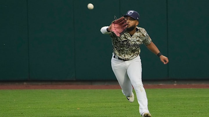 Jun 28, 2023; Columbus, Ohio, USA;  Columbus Clippers right fielder George Valera (13) catches a ball during the MiLB baseball game against the Toledo Mud Hens at Huntington Park. Mandatory Credit: Adam Cairns-The Columbus Dispatch