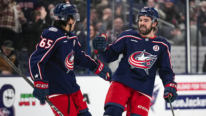Jan 25, 2025; Columbus, Ohio, USA; Columbus Blue Jackets defenseman Dante Fabbro (15) celebrates with center Luca Del Bel Belluz (65) after Fabbro scored in the third period of the game at Nationwide Arena on Saturday, Jan. 25, 2025 in Columbus, Ohio.   Mandatory Credit: Samantha Madar/USA TODAY Network via Imagn Images 