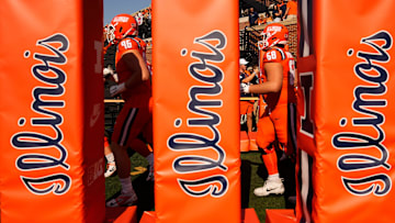 The Illinois Fighting Illini take the field prior to the NCAA football game against the Ohio State Buckeyes at Gies Memorial Stadium in Champaign on Oct. 11, 2025.