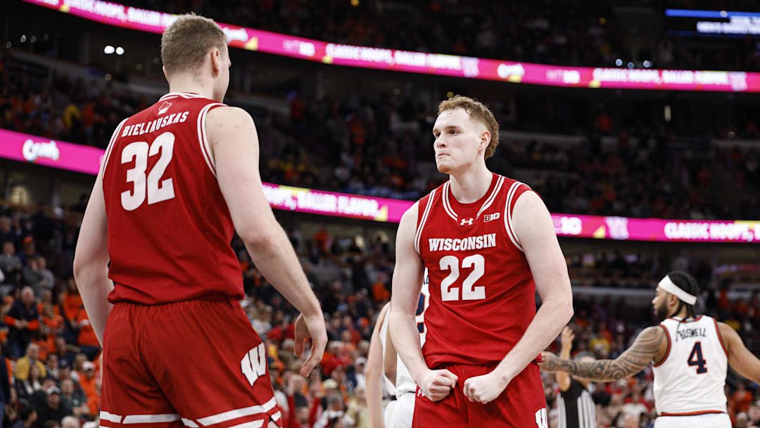 Mar 13, 2026; Chicago, IL, USA; Wisconsin Badgers forward Austin Rapp (22) reacts during overtime at United Center. Mandatory Credit: Kamil Krzaczynski-Imagn Images