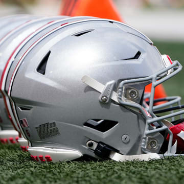 Sep 2, 2023; Bloomington, Indiana, USA; Ohio State Buckeyes helmets sit on the sideline prior to the NCAA football game at Indiana University Memorial Stadium. Ohio State won 23-3.