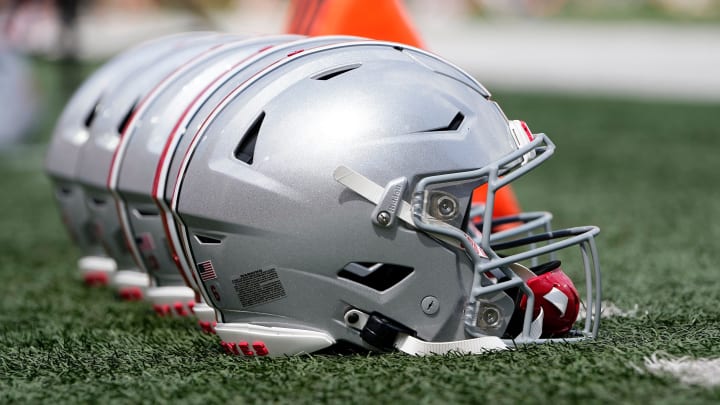 Sep 2, 2023; Bloomington, Indiana, USA; Ohio State Buckeyes helmets sit on the sideline prior to the NCAA football game at Indiana University Memorial Stadium. Ohio State won 23-3.