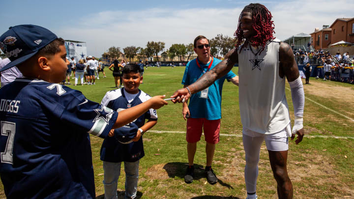 Oxnard, CA, USA; Dallas Cowboys wide receiver CeeDee Lamb (88) interacts with fans during training camp at the Marriott Residence Inn-River Ridge playing fields. 