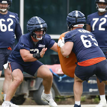 Drew Dalman runs though a blocking drill against Luke Newman with the pads. The interior of the line should find coping with Grady Jarrett daily sharpens their skills.