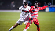 Ohio State Buckeyes midfielder Michael Adedokun (17) fights for the ball against Stanford forward Alfonso Tenconi-Gradillas (11) in the first half of the third round of the NCAA tournament at Jesse Owens Memorial Stadium on Sunday, Dec. 1, 2024 in Columbus, OH.