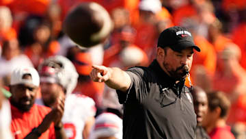Ohio State Buckeyes head coach Ryan Day motions during warm ups prior to the NCAA football game against the Illinois Fighting Illini at Gies Memorial Stadium in Champaign on Oct. 11, 2025.