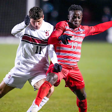 Ohio State Buckeyes midfielder Michael Adedokun (17) fights for the ball against Stanford forward Alfonso Tenconi-Gradillas (11) in the first half of the third round of the NCAA tournament at Jesse Owens Memorial Stadium on Sunday, Dec. 1, 2024 in Columbus, OH.