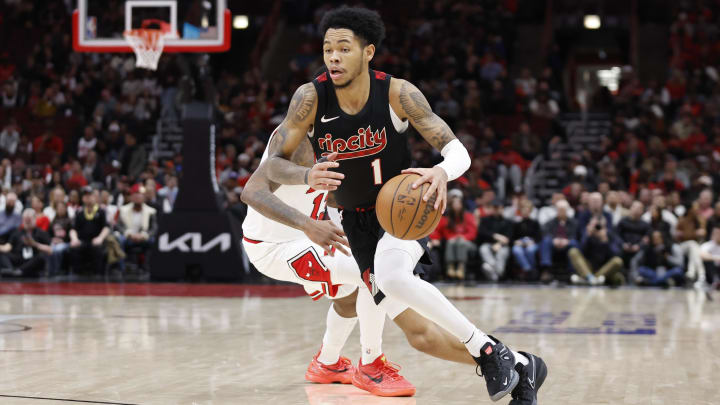 Mar 18, 2024; Chicago, Illinois, USA; Portland Trail Blazers guard Anfernee Simons (1) drives to the basket against the Chicago Bulls during the second half at United Center.