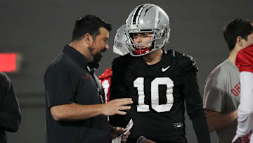 Mar 7, 2024; Columbus, OH, USA; Ohio State Buckeyes head coach Ryan Day talks to quarterback Julian Sayin (10) during spring football practice at the Woody Hayes Athletic Center.