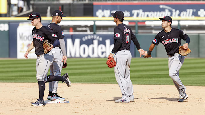 Sep 11, 2024; Chicago, Illinois, USA; Cleveland Guardians players celebrate after defeating the Chicago White Sox in a baseball game at Guaranteed Rate Field. Mandatory Credit: Kamil Krzaczynski-Imagn Images