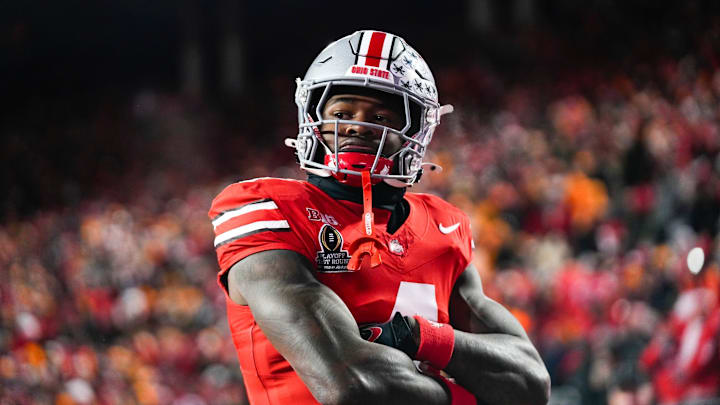 Ohio State freshman Jeremiah Smith has 63 receptions for 1,037 yards and 12 touchdowns this season.