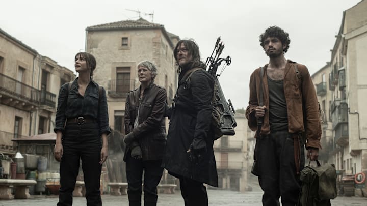 Candela Saitta as Justina, Melissa McBride as Carol Peletier, Norman Reedus as Daryl Dixon, Hugo Arbués as Roberto - The Walking Dead: Daryl Dixon _ Season 3 - Photo Credit: Manuel Fernandez-Valdes/AMC