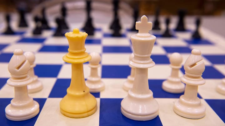 Chess pieces on a board.
